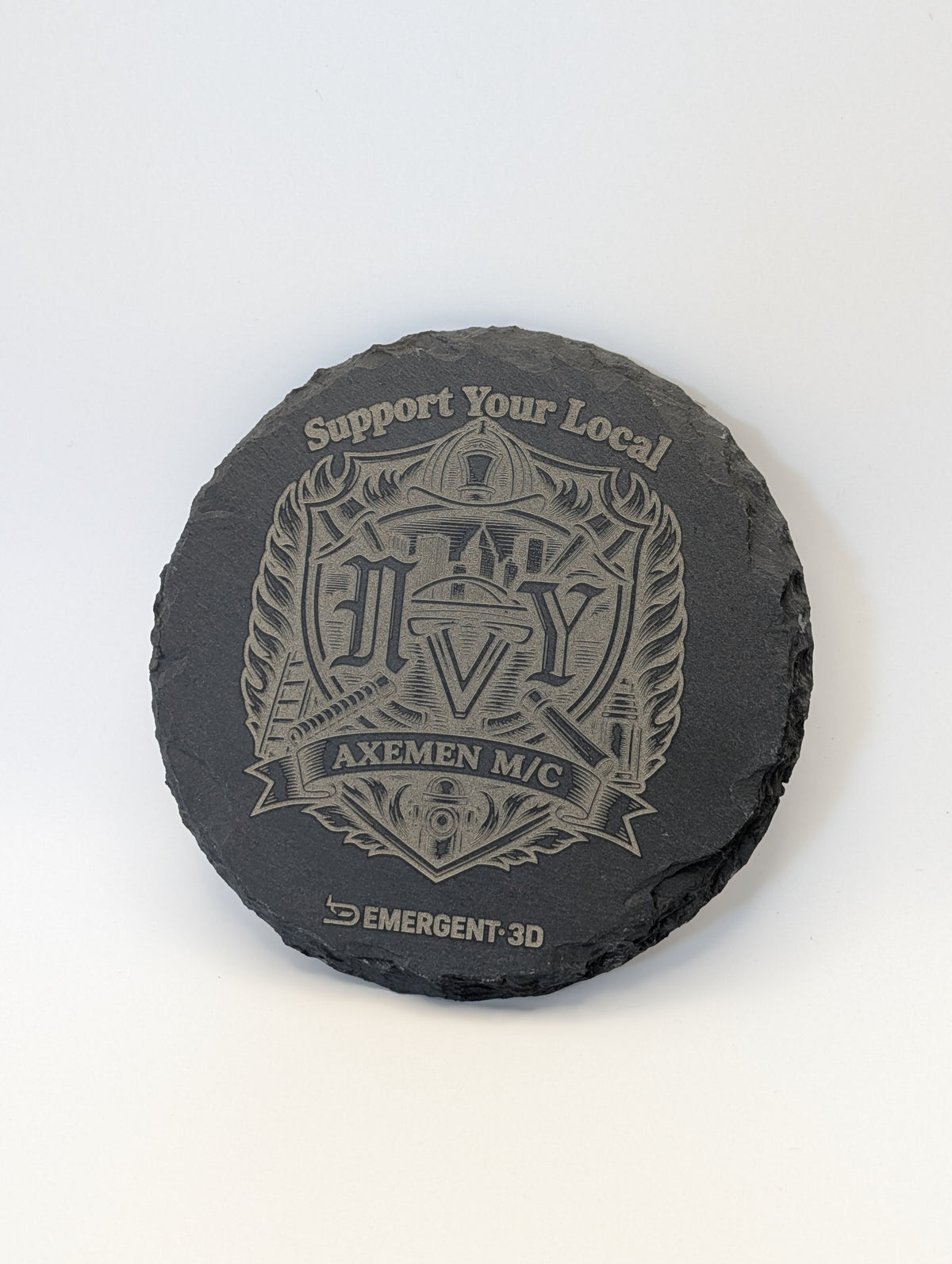 Angled product view of a round laser engraved slate coaster with firefighter artwork