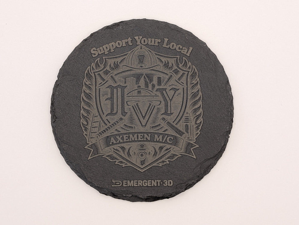 Close-up of a round polyurethane-finished laser engraved slate coaster with detailed firefighter artwork
